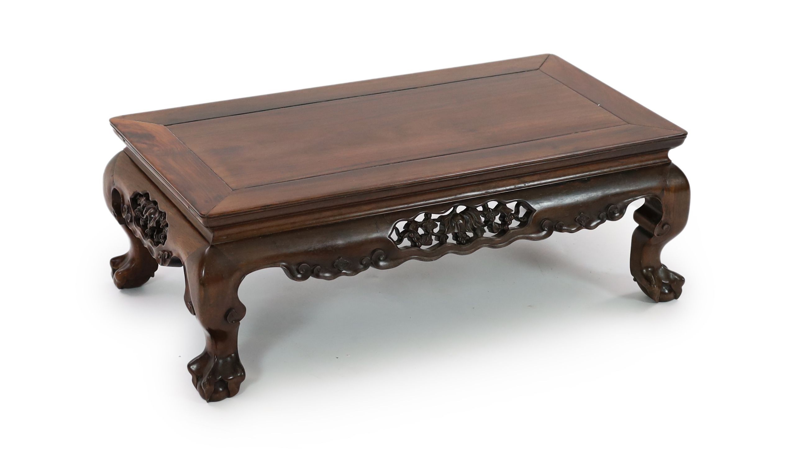 A Chinese hongmu Kang table, 19th century, 79 cm long, 43 cm wide, 27 cm high, old repairs